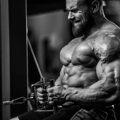 Brutal Strong Bodybuilder Athletic Man Pumping Up Muscles Workout Bodybuilding